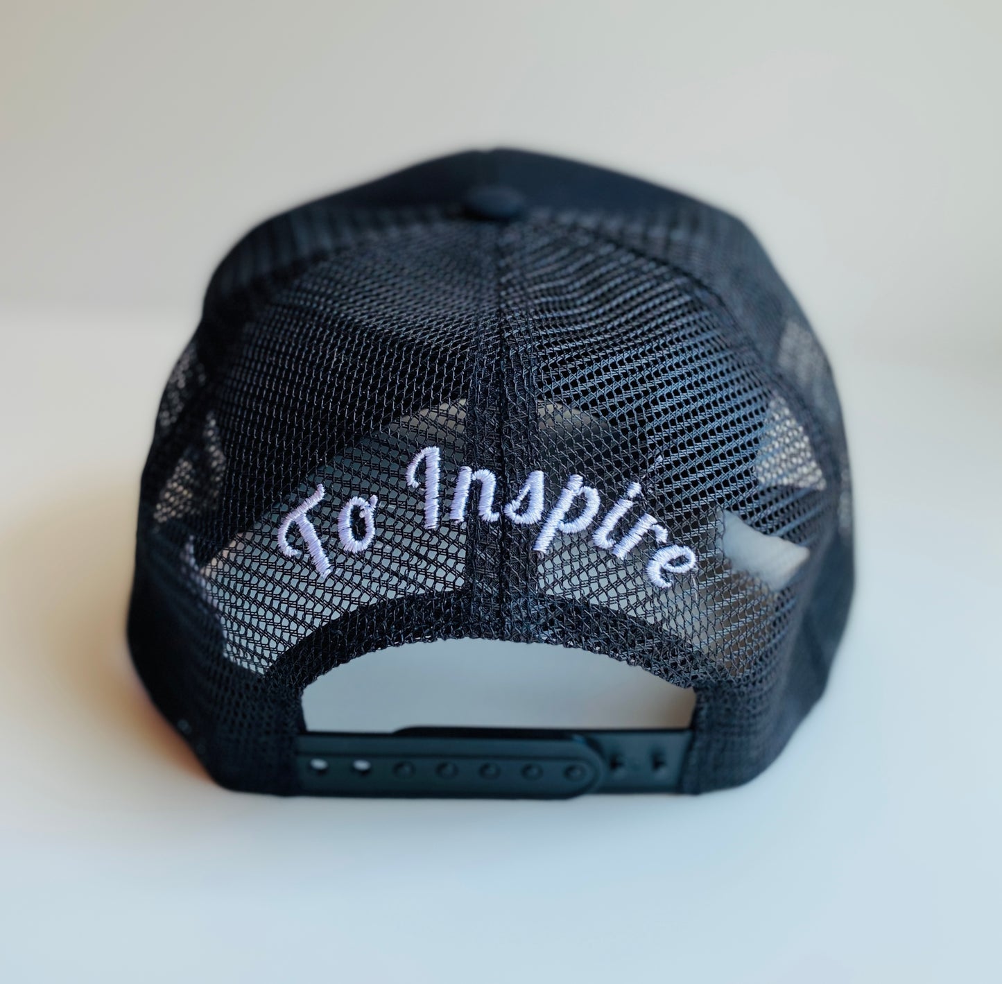 Black intelligence trucker hat