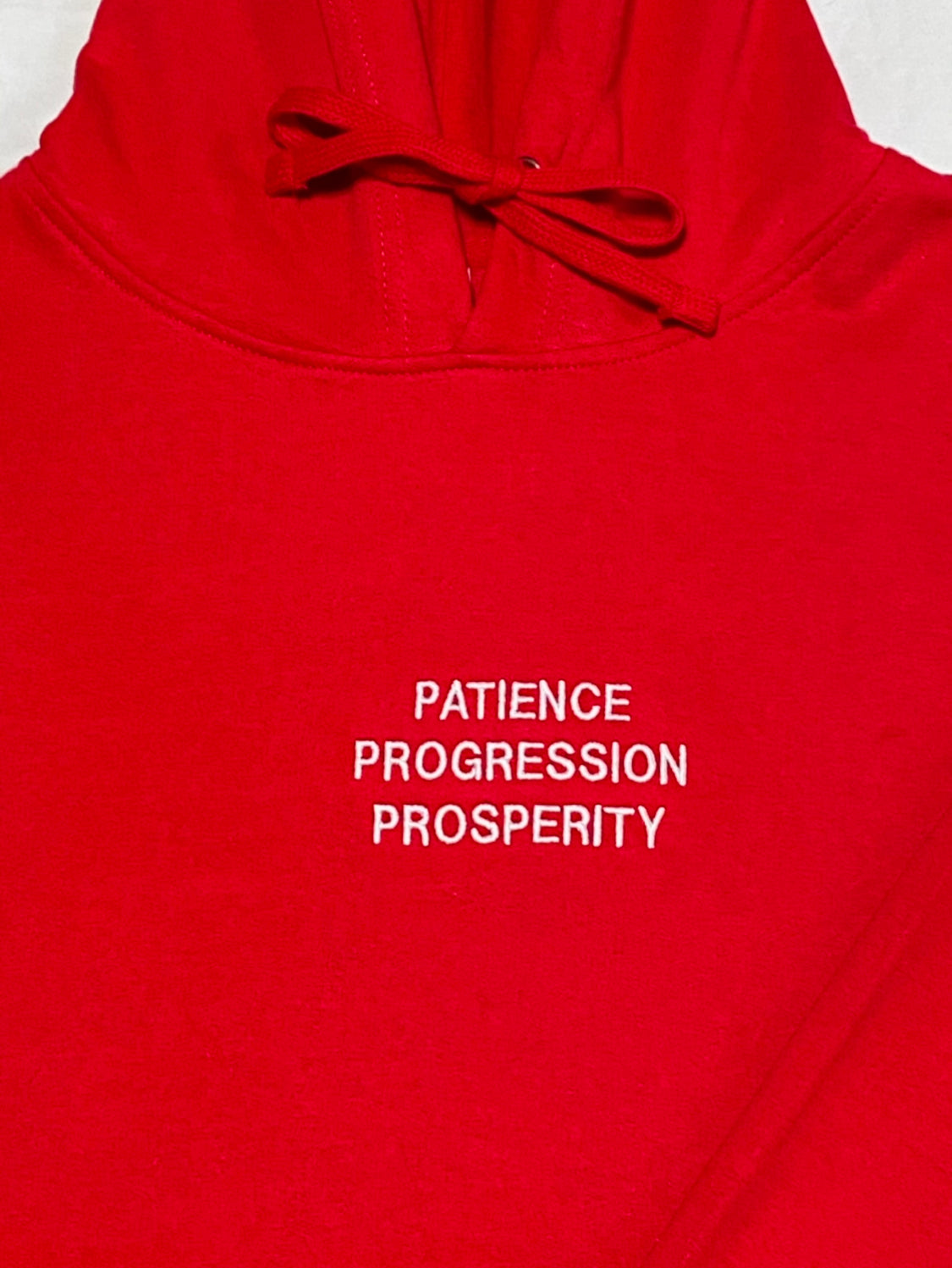 Patience, Progression, Prosperity red hoodie